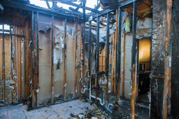 Professional Emergency Fire Damage Restoration technician working in Elk River, MN